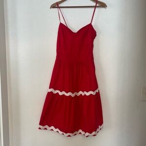 Adorable red Velvet Torch dress with with trim (size M)